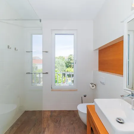 Sunny Side Escape By Belmont Realty *
