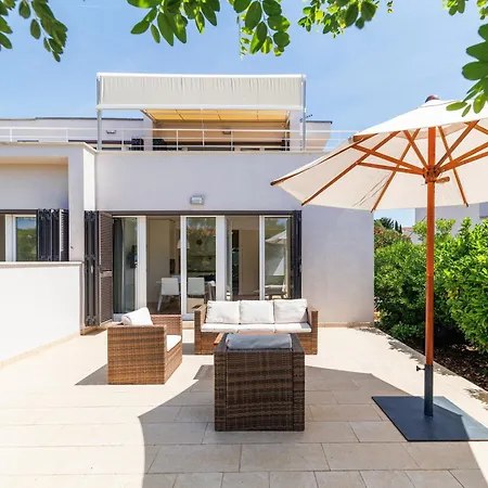 Sunny Side Escape By Belmont Realty *